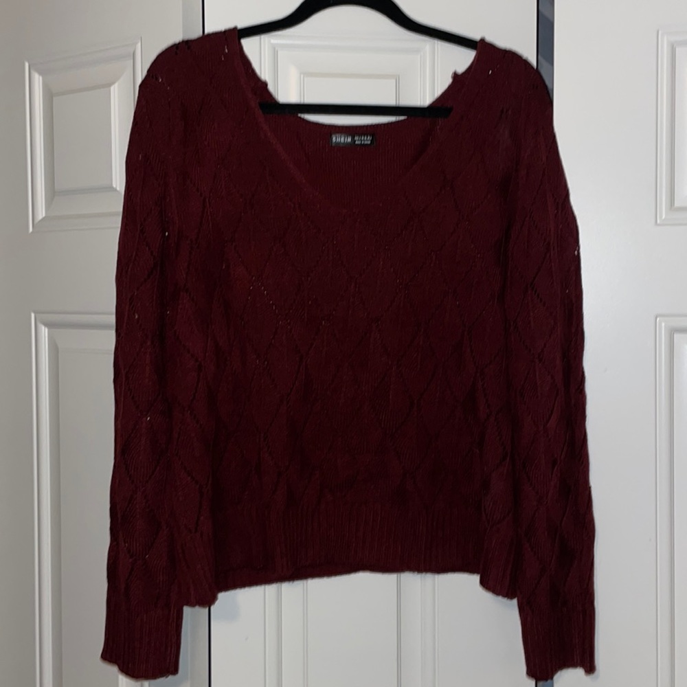 V- neck pointelle knit sweater